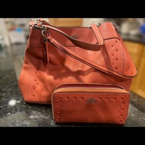 Beautiful deep coral Coach purse and matching wallet